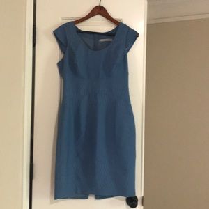 Blue fitted dress.